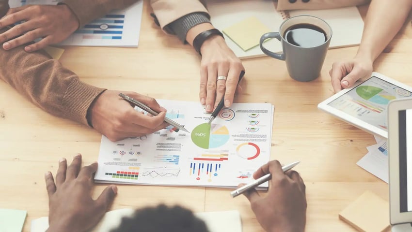 8 steps to a winning insurance agency marketing strategy - people discuss about graphs and rates
