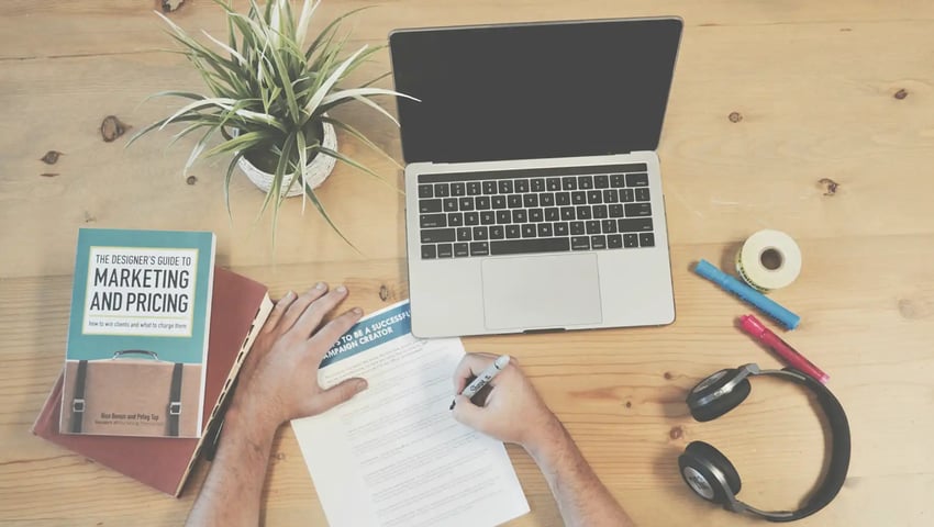A person reading about digital marketing must-haves for insurance agents