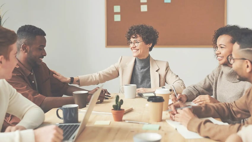 Colleagues discussing starting an insurance agency as a captive agent